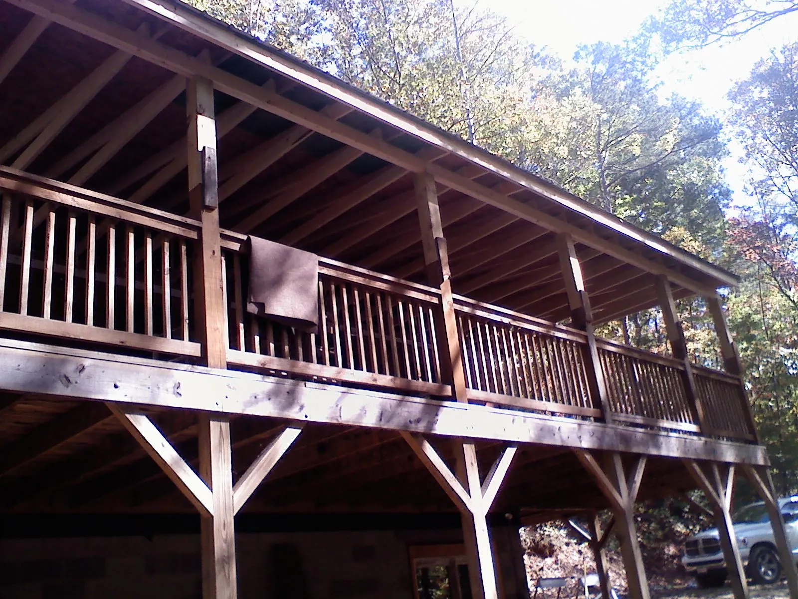 Timber framing under a new elevated porch and deck — Roof Leak Repair in Elwell by Roofing Brothers